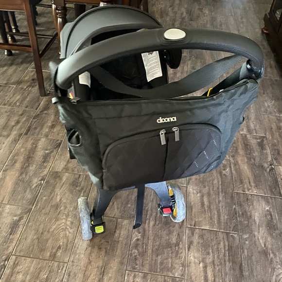 Midnight black doona stroller. - Picture 5 of 7